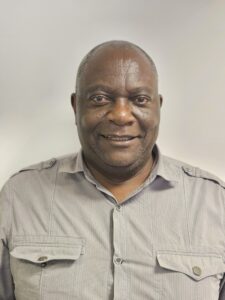 Head and shoulders image of Chris Nyabezi, a member of the employment team at Autism Plus